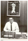 Dom DiMaggio Sitting behind his desk at Delaware Valley Corporation